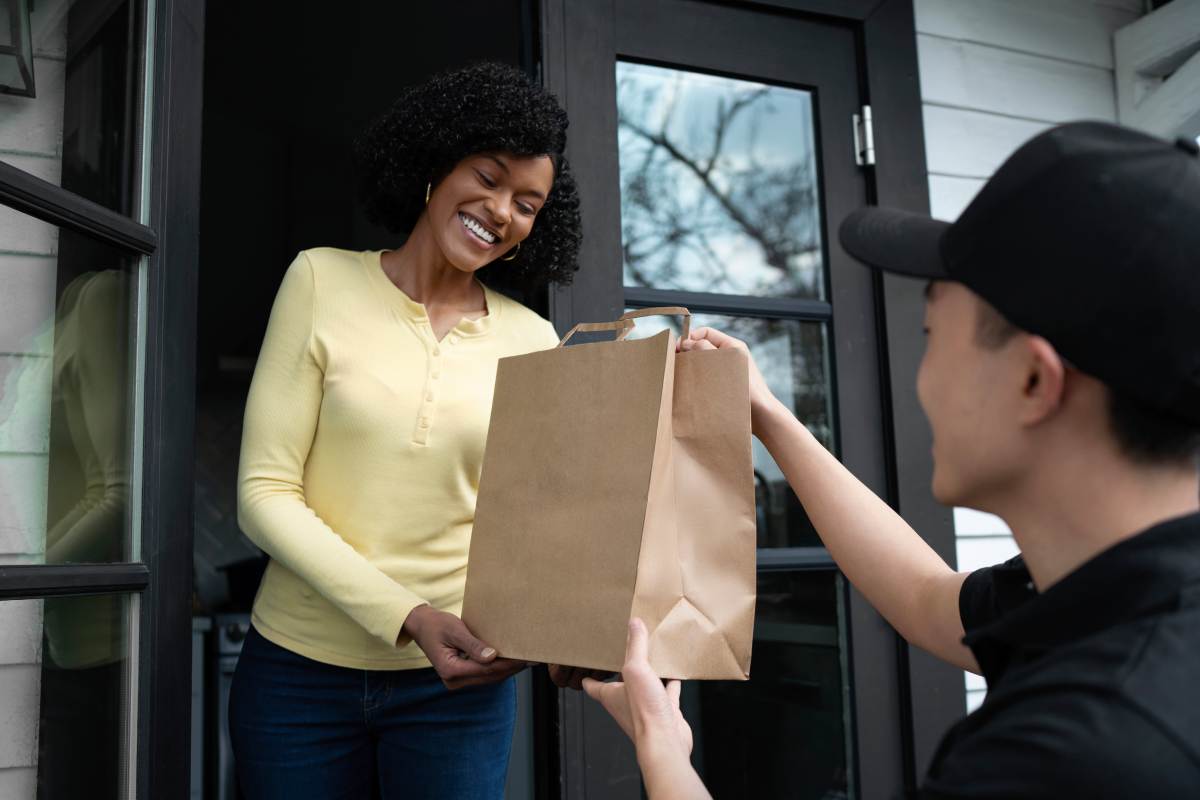 Delivery person getting parcel